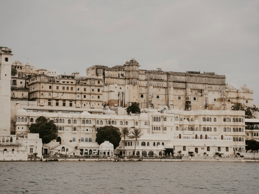 A view of Udaipur City Palace from across Lake Pichola.