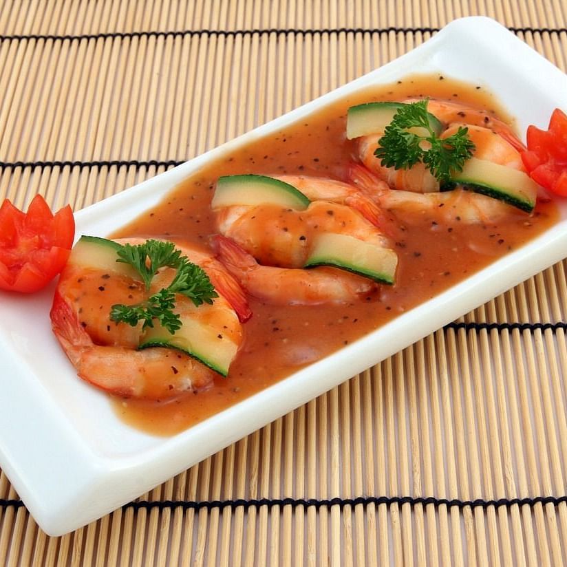 A colourful and neatly plated appetiser placed on a mat in the bar of GK Hill View Resort.