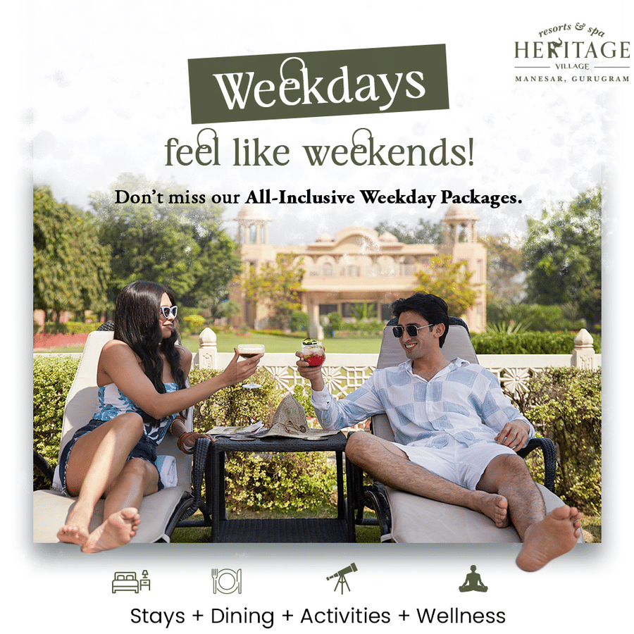 Promotional poster for weekday wellness package at Heritage Village Resorts & Spa, Manesar showing two guests seated on a lawn.
