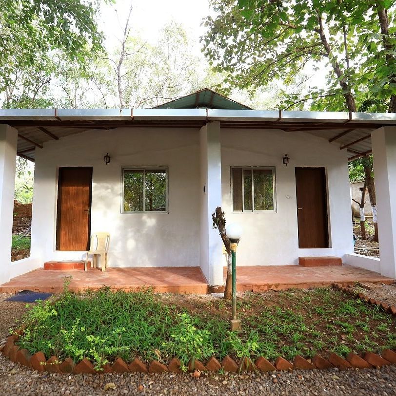 Warli Huts Exterior - Sajan - Experience rustic charm in the Warli AC & Non AC Huts at Nature Trails Sajan, reflecting local heritage.