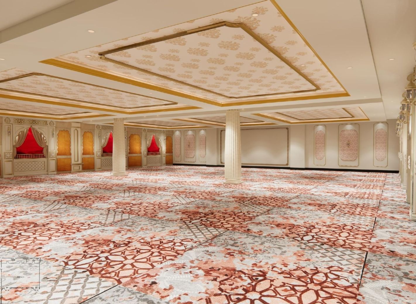Banquet hall showcasing ceiling flower motifs, large supporting pillars, ambient glow, and walls inspired by Indian window designs