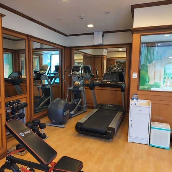 Fully equipped fitness center at St Marks Hotel with treadmills, weights, and gym amenities