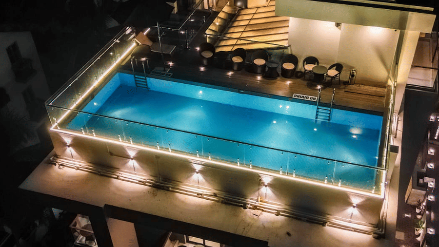 Rooftop swimming pool with surrounding seating and open views at Hotel Southgate Goa, Calangute, offering guests a refreshing place to relax and unwind.