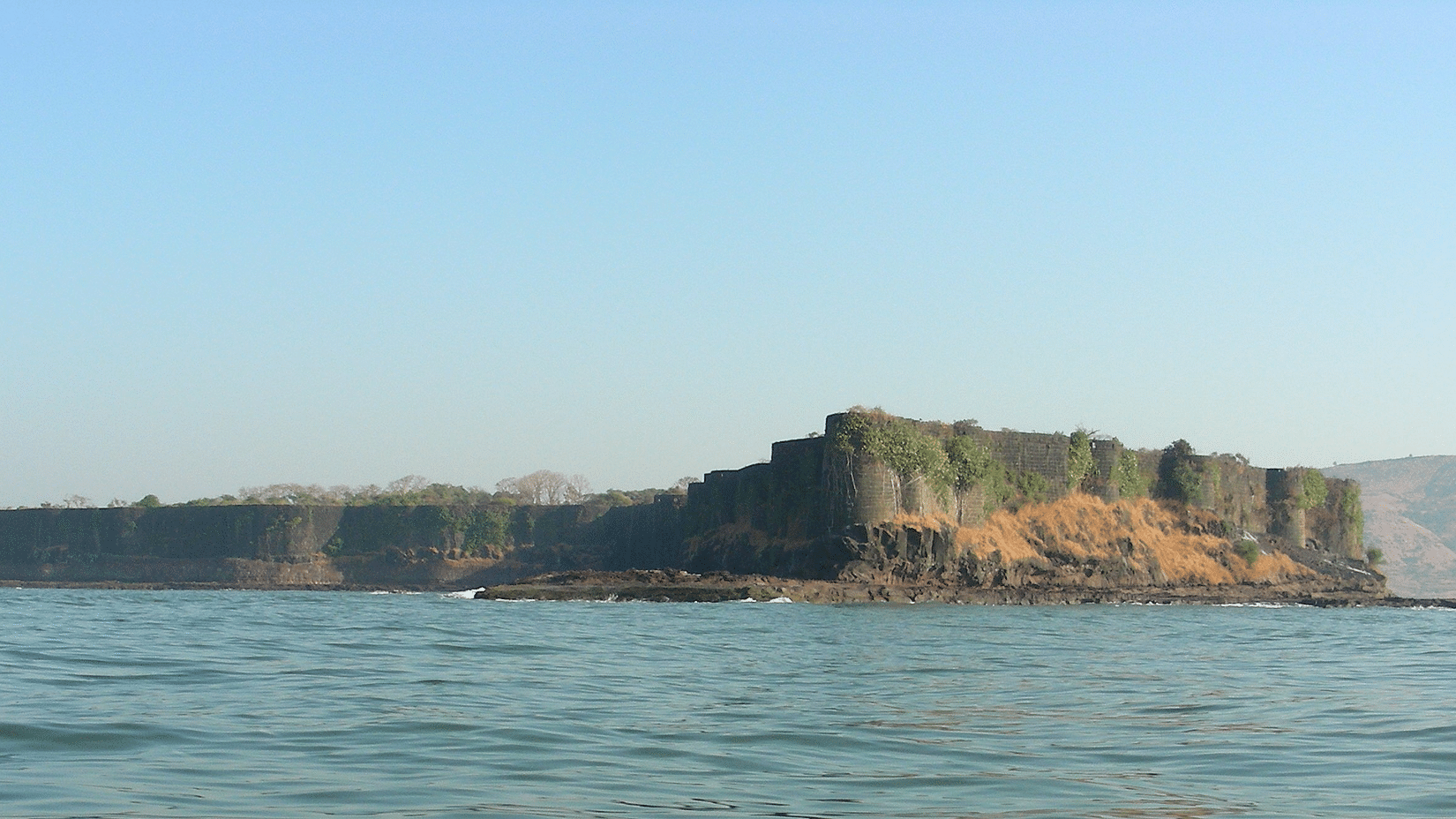 an image of Suvarnadurg fort surrounded by water - Location of Lotus Eco Beach Resort, Murud