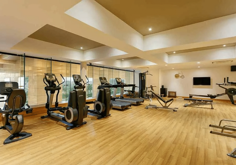 Gym with treadmills at Karma Chalets.
