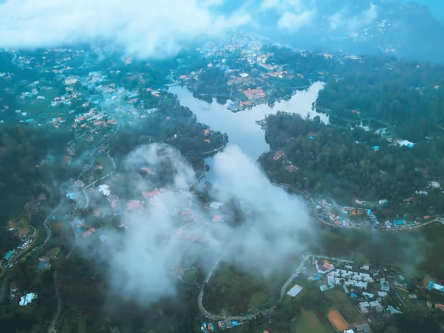 an aerial image of clouds over kodaikanal