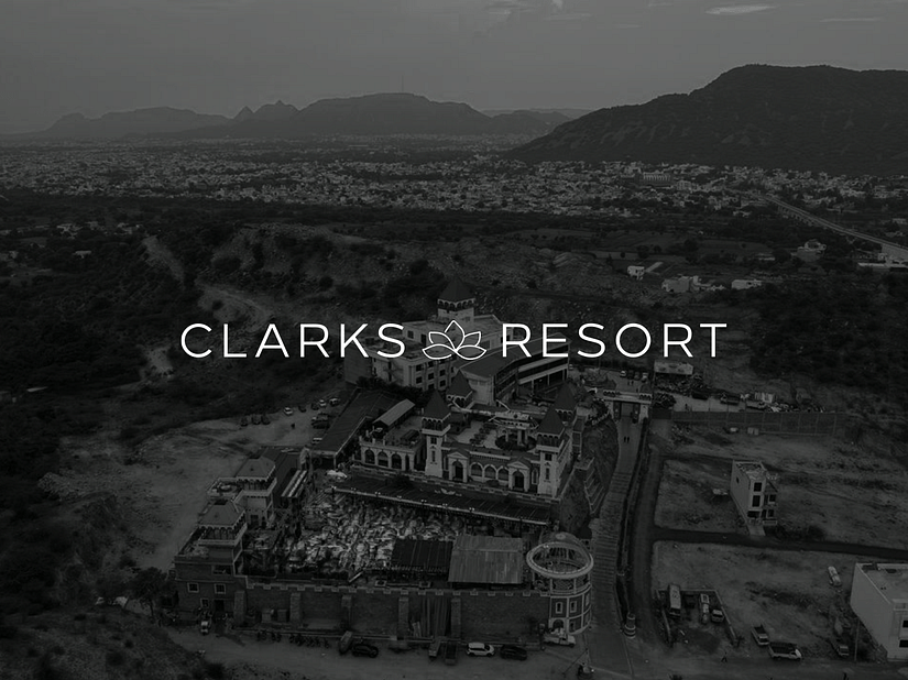 Aerial view of Clarks Resort in monochrome with the text 'CLARKS RESORT' in caps