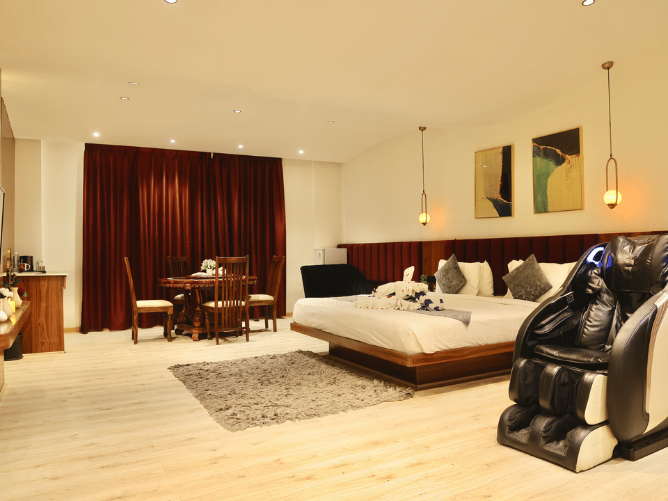 Skyline by Miraya, Miraya Club, Massage chair and dining setting in the suite