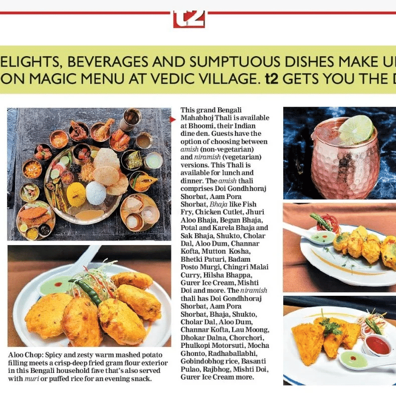 A newspaper clipping from The Telegraph highlighting the food in Vedic Village Spa Resort.