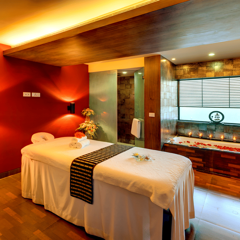 Massage room with a massage table at spa in Kolkata (Park Street) at Kenilworth Hotel