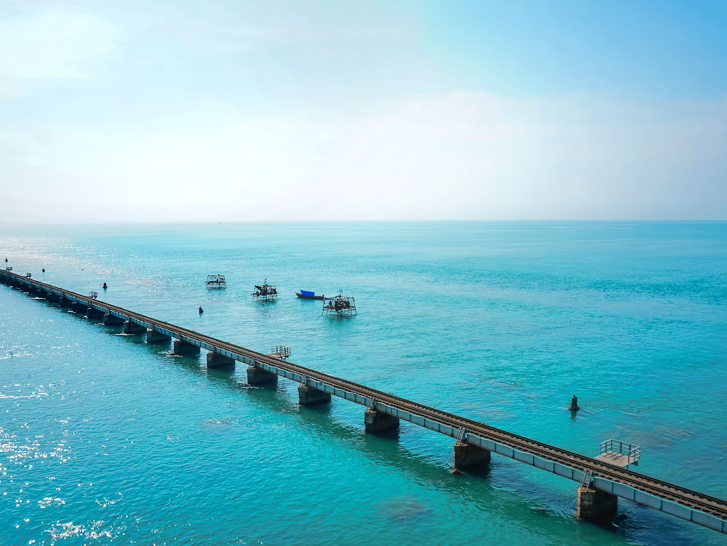 Image of a long bridge stretching over a water body