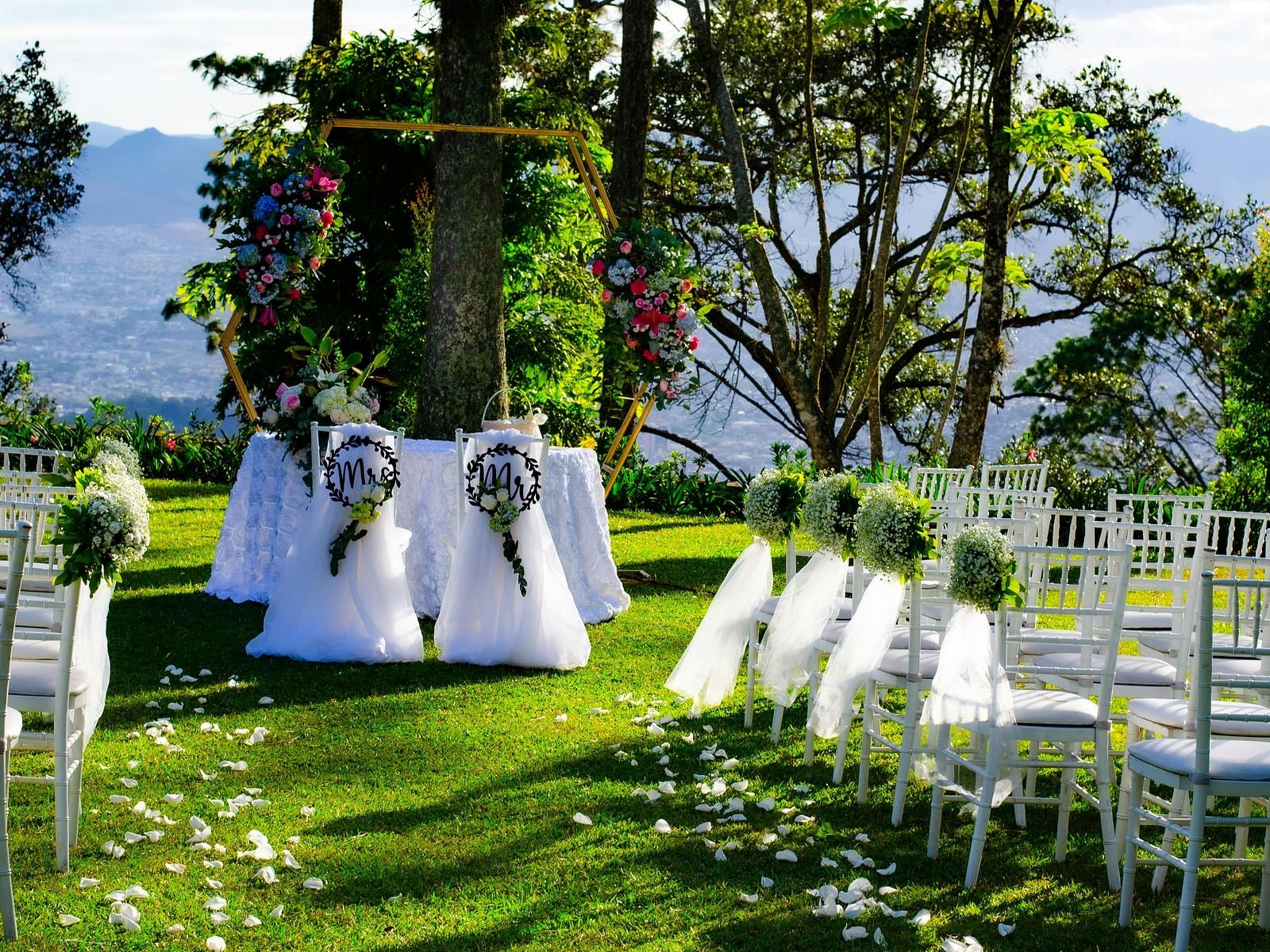 Wedding arrangements in the lawn area, with chairs and decorations thoughtfully arranged to create an aesthetically pleasing setting