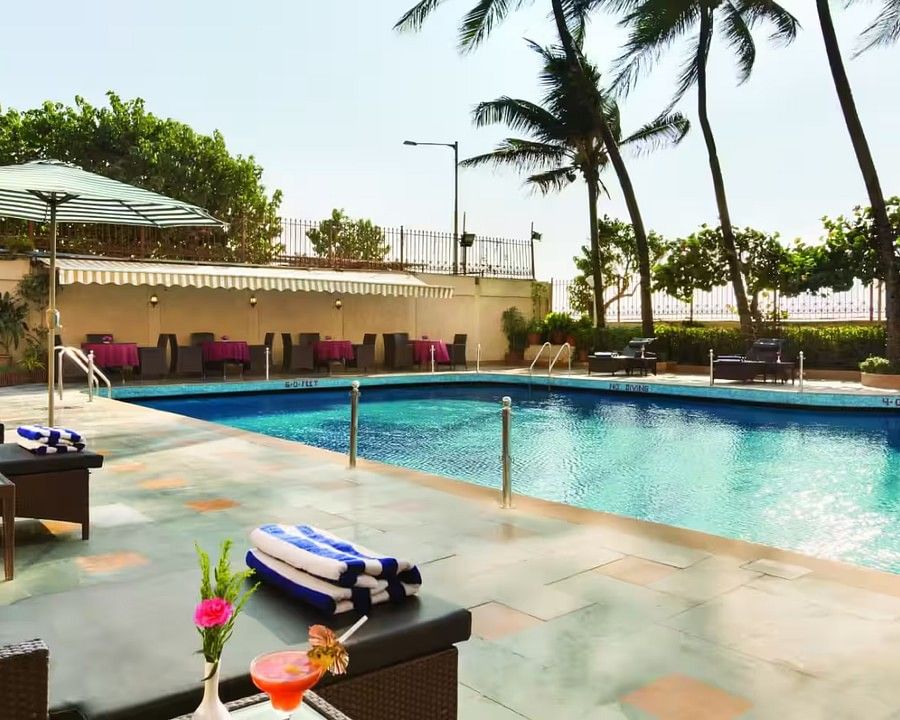 Pool Side Patio at Hotel Ramada Plaza Palm Grove  Juhu Beach  Pool Side Restaurants in Juhu adkdker kki0jx