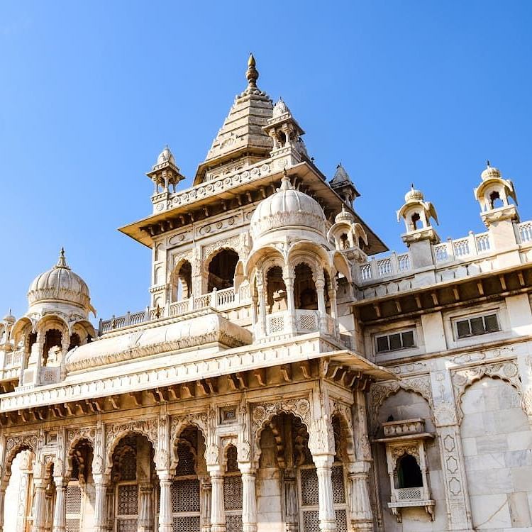 Facade of Jaswant Thada with intricate detailing on the walls.