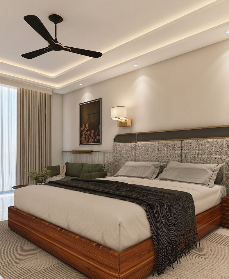 A room with modern interiors and bright lighting featuring a double bed in the middle along with two bed side tables. - Namaste Corbett