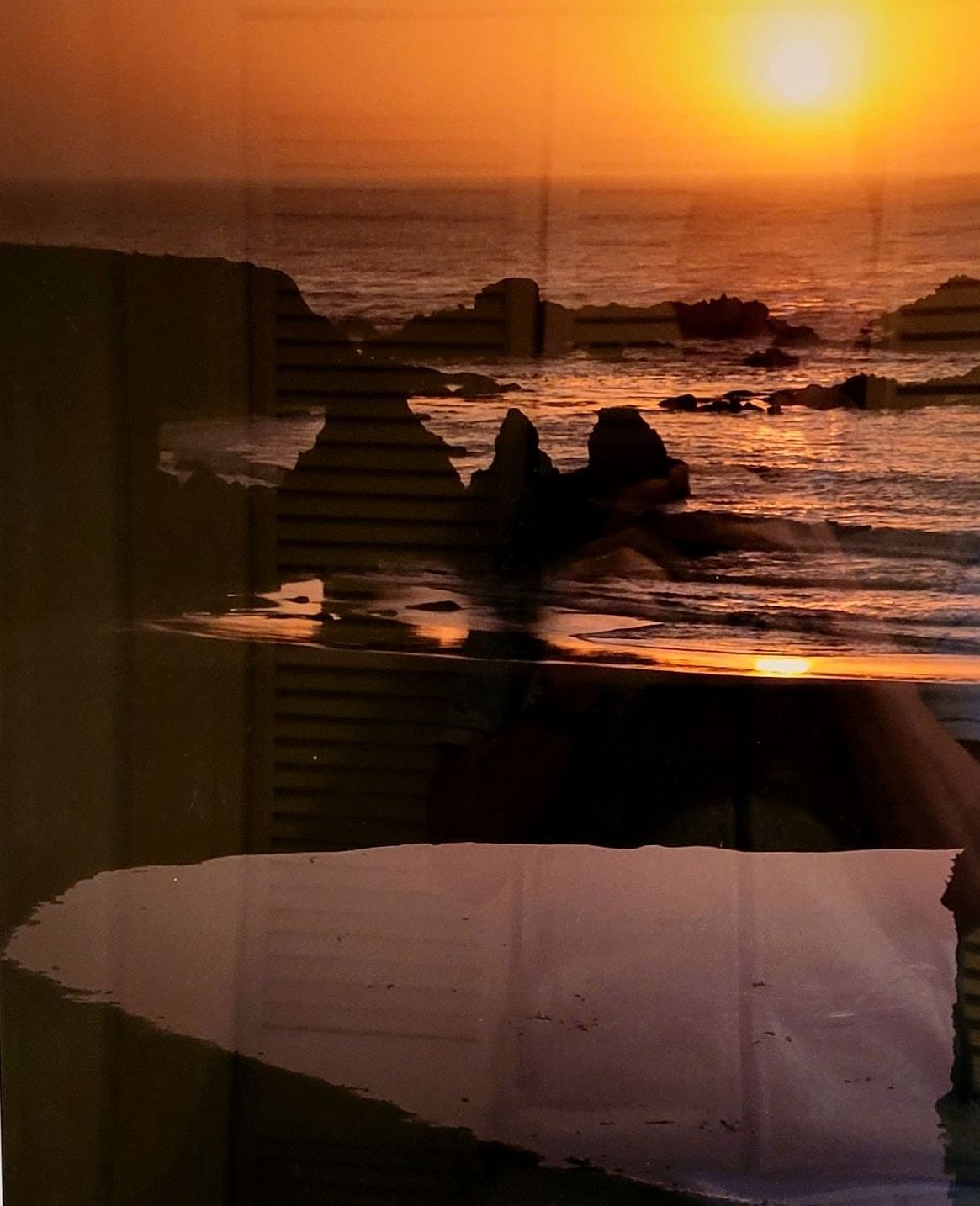 A framed sunset painting at Brewery Gulch Inn & Spa