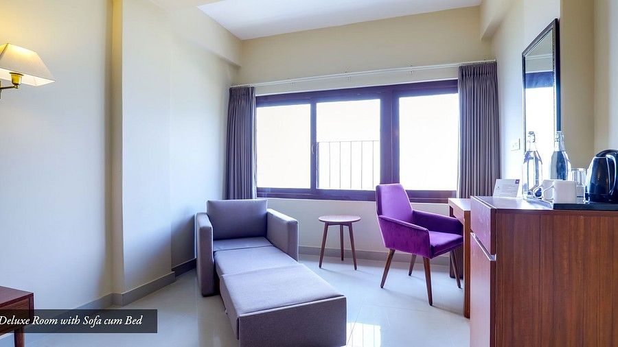 Deluxe-room-with-sofa-cum-bed1