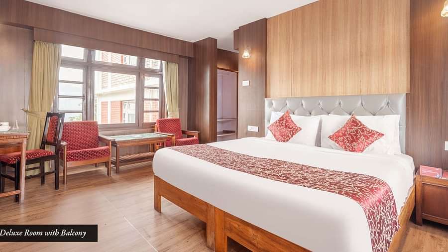 Image of a room with with double bed and sitting area at at Summit Tashi Ghang Heritage Resort, Pelling