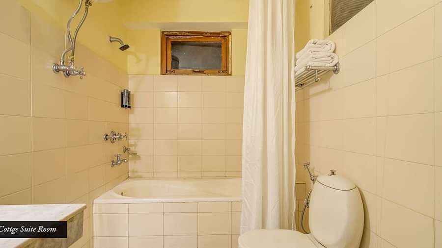 Image of a washroom with bathtub and modern amenities at Summit Tashi Ghang Heritage Resort, Pelling