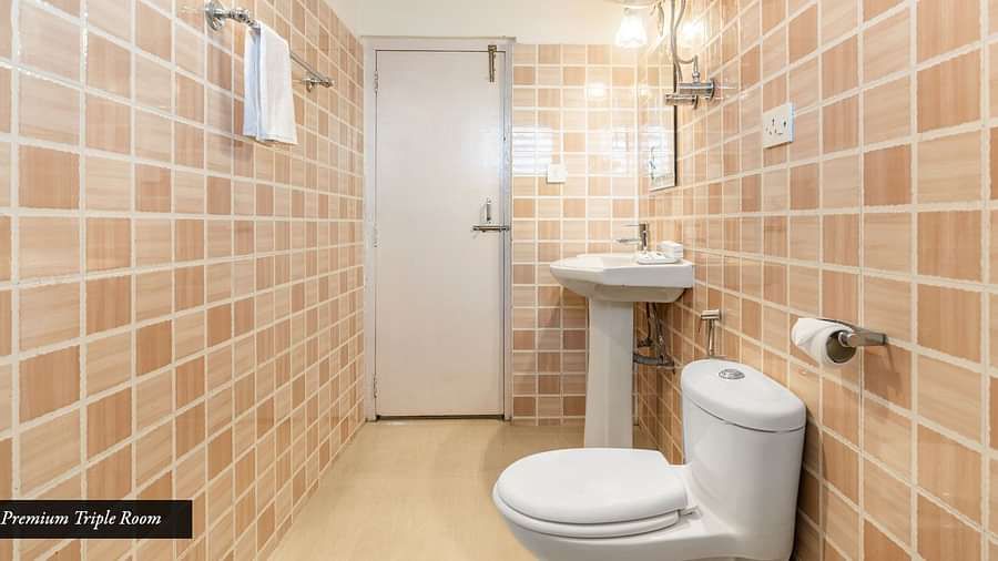 Image of a restroom with modern amenities at Summit Tashi Ghang Heritage Resort, Pelling