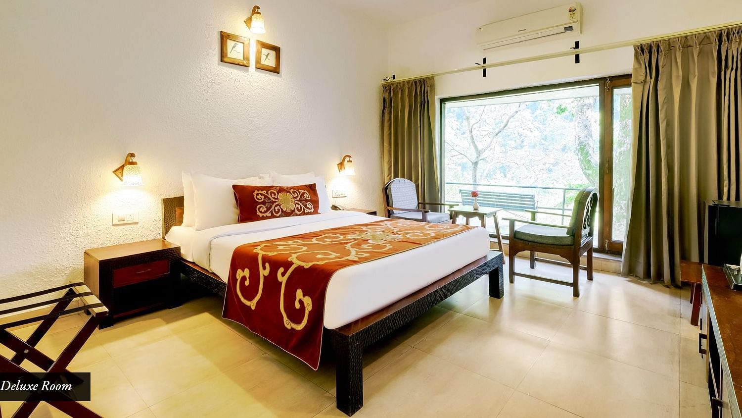 Image of a room with bed and large windows at Summit By The Ganges Beach Resort & Spa, Rishikesh