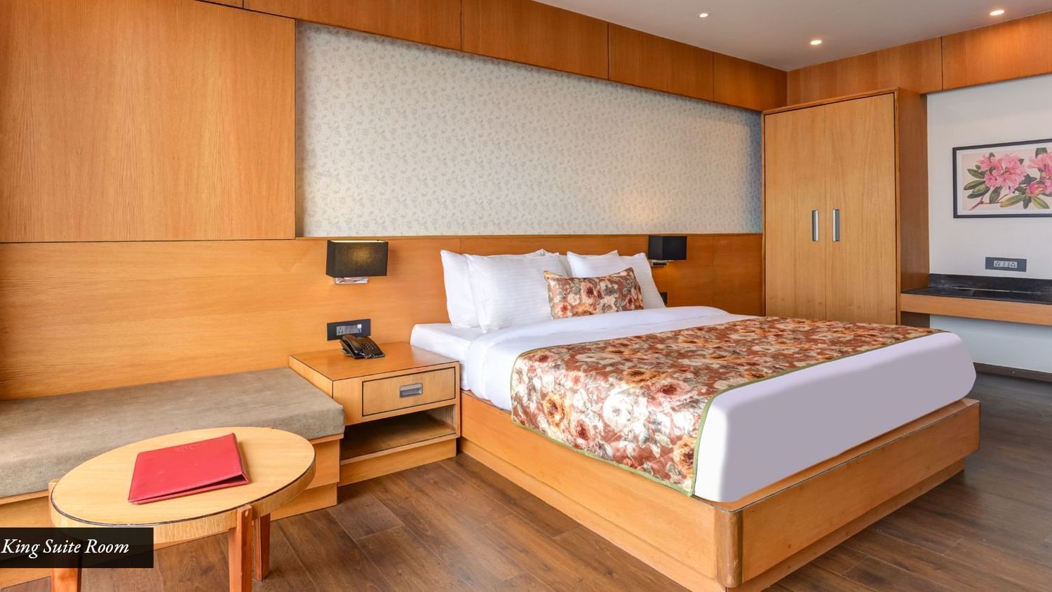 Presidential Suite with spacious twin beds and wall mounted televison along with large windows