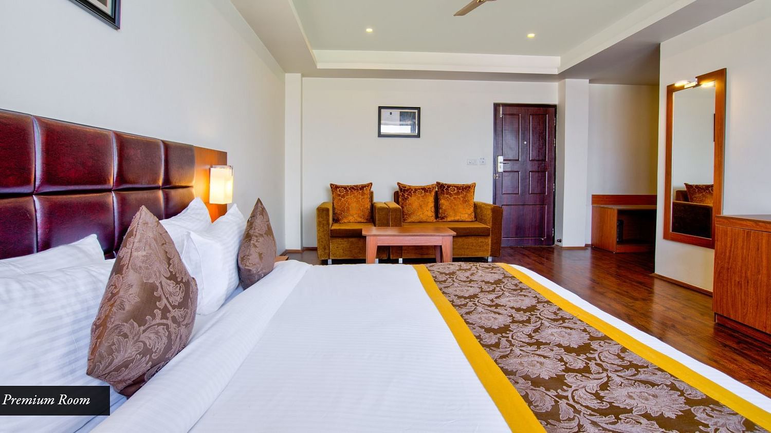 Premium Room with spacious bed, cushion furniture at Summit Ttakshang Residency Hotel & Spa, Gangtok1