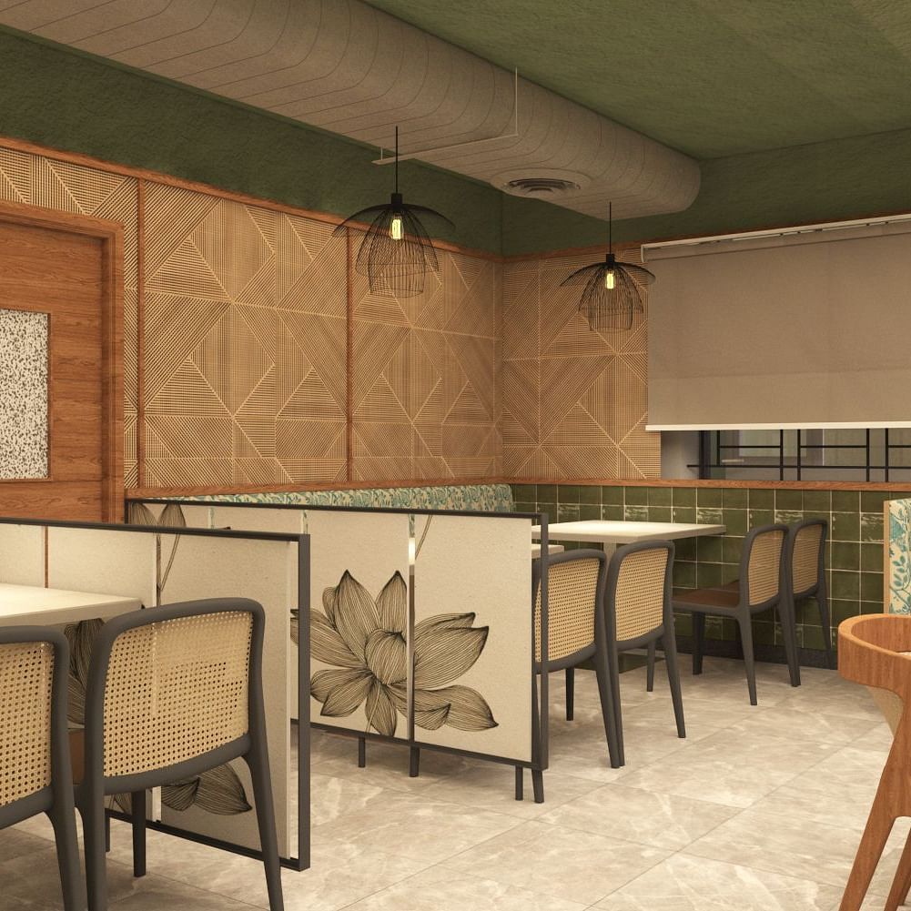 Image of a dining space with chiars and tables at Hotel Raai.
