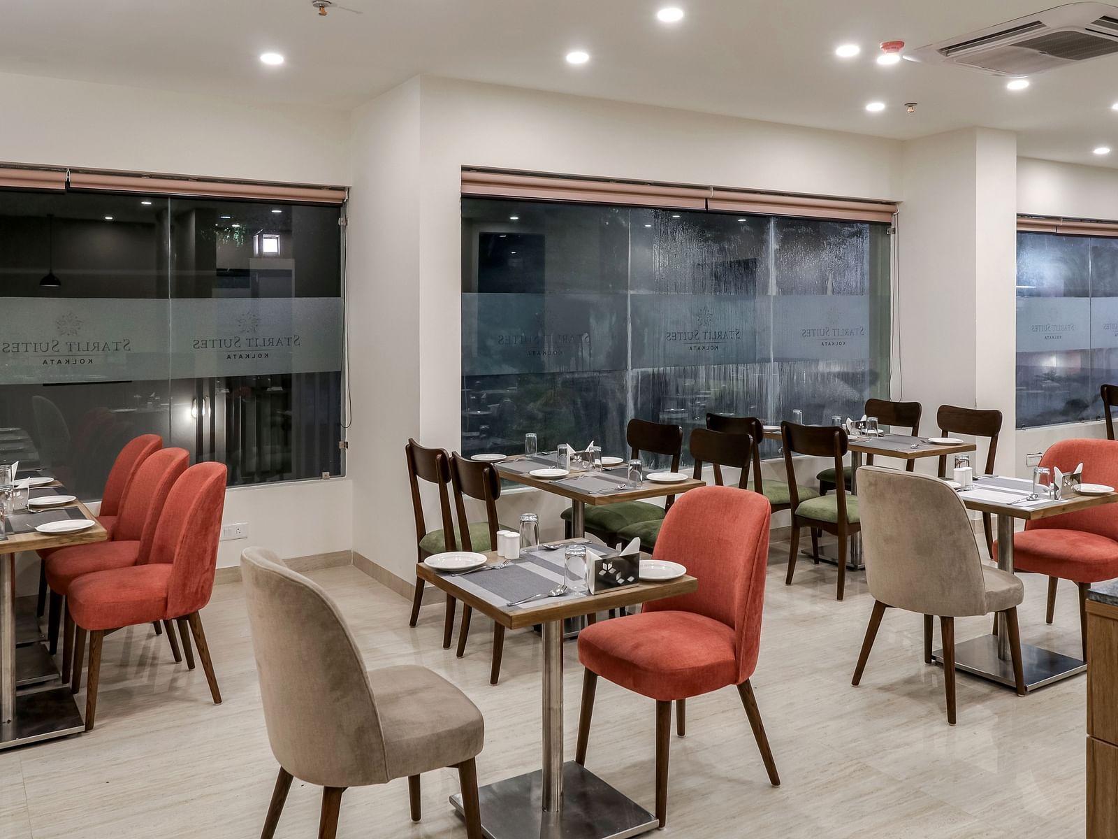 Seating arrangemetn inside Gourmet 3 - Starlit Suites Newtown, Kolkata