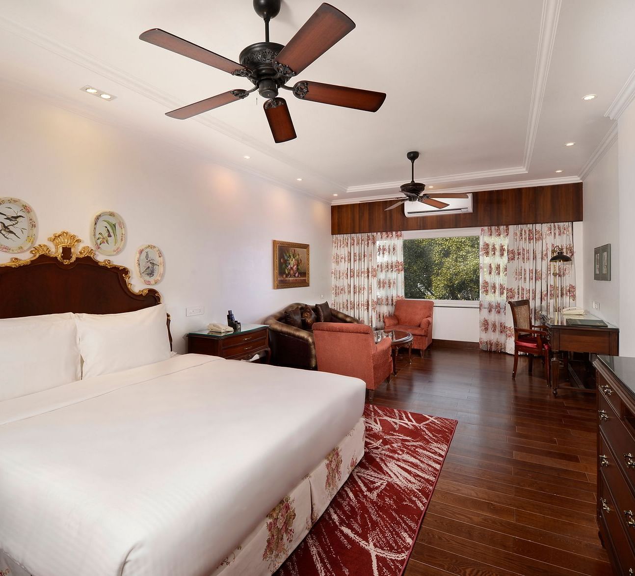 a king size bed facing the TV - Mayfair Himalayan Spa Resort Kalimpong 1