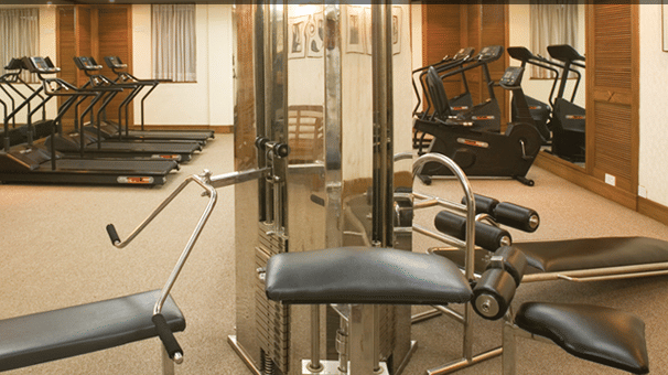 An overview of the The Retreat Club with many fitness equipments at The Retreat Hotel and Convention Centre, Madh Island
