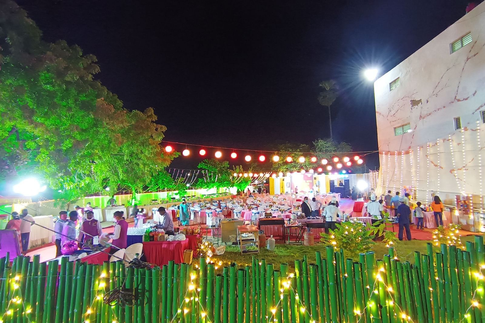 A view of an event in Tuticorin held at the Starlight Garden, with fences adorned with bright lights - Regency Tuticorin by GRT Hotels