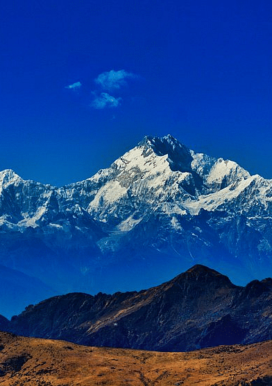 Mountains with snow-covered peaks in the background.
