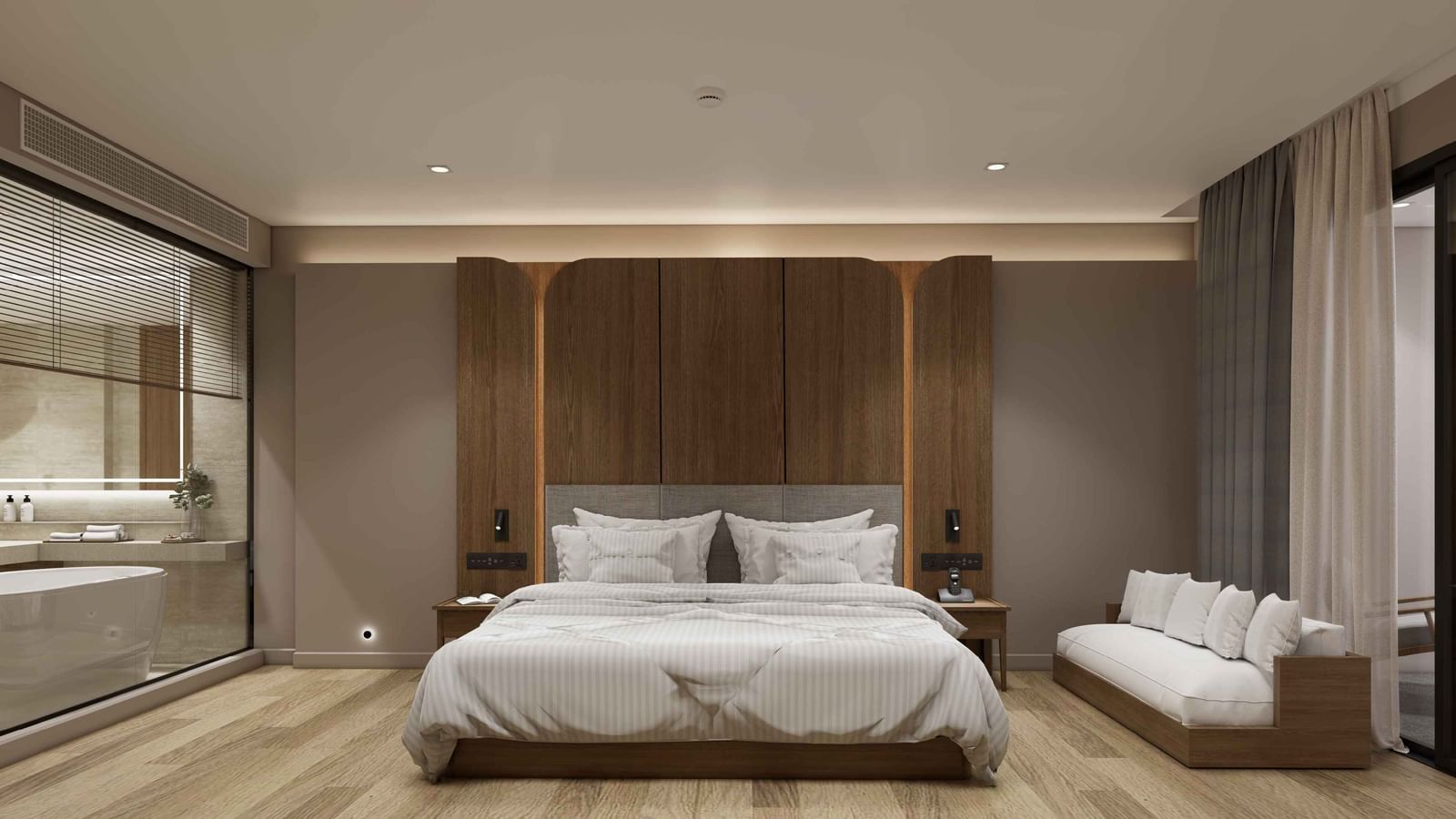 Bedroom with large bed, sofa, and wooden flooring at Ramada Resort by Wyndham Khao Lak.