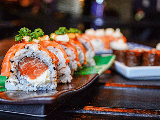 a plate of sushi served