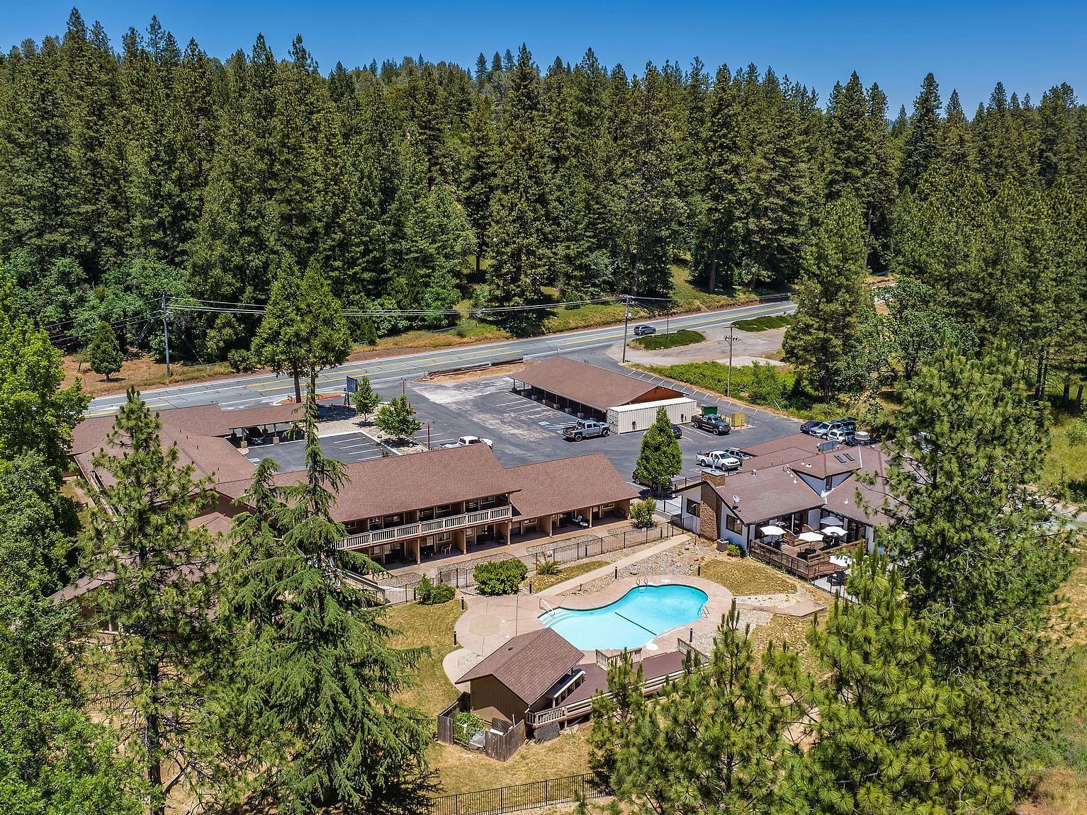Aerial view of Amador Hotel with a view of the forest in the backdrop