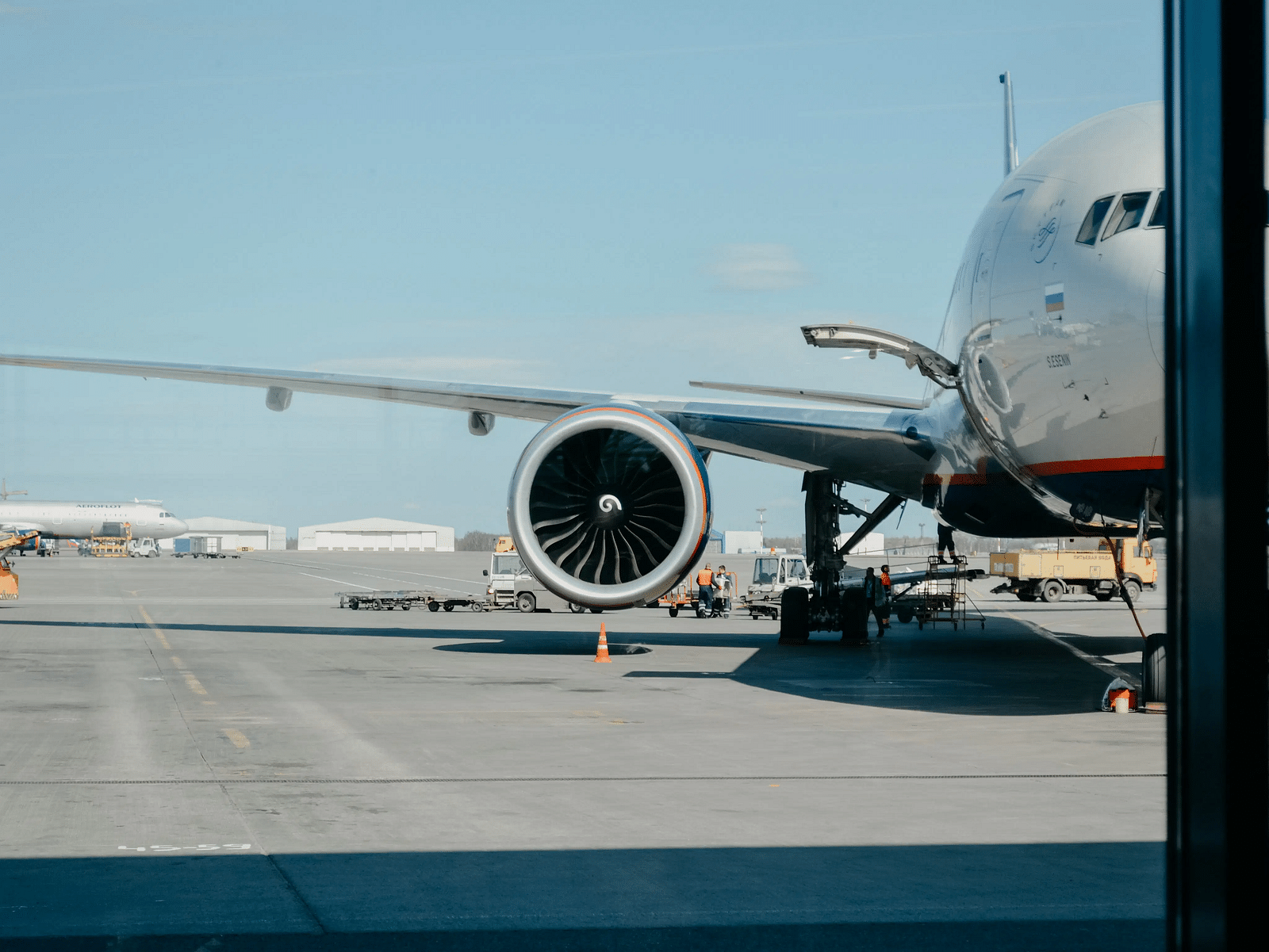 An aeroplane parked in an airport