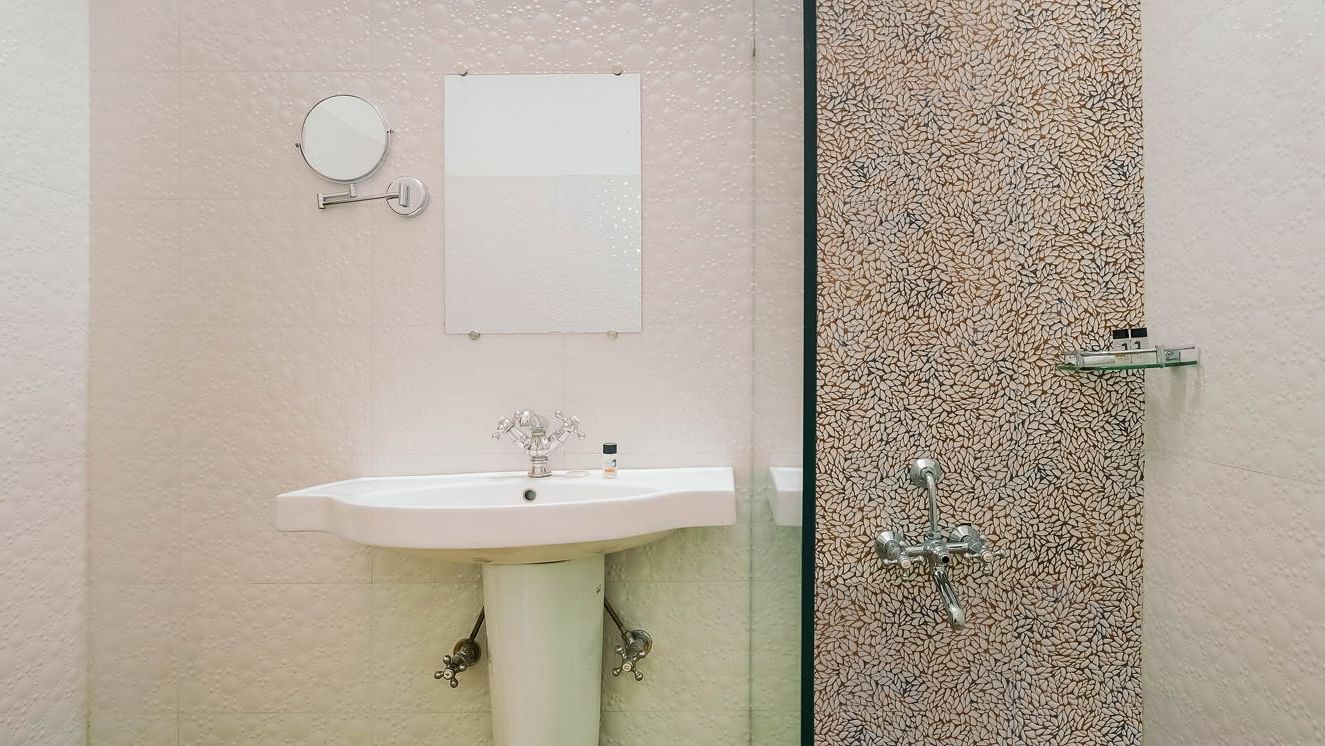 Image of a wahsroom with seperate shower area at Summit By The Ganges Beach Resort & Spa, Rishikesh