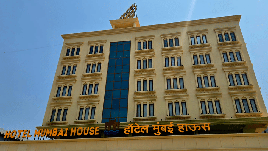 Daytime view of hotel exterior with modern façade at Hotel Mumbai House, Digha, Airoli.
