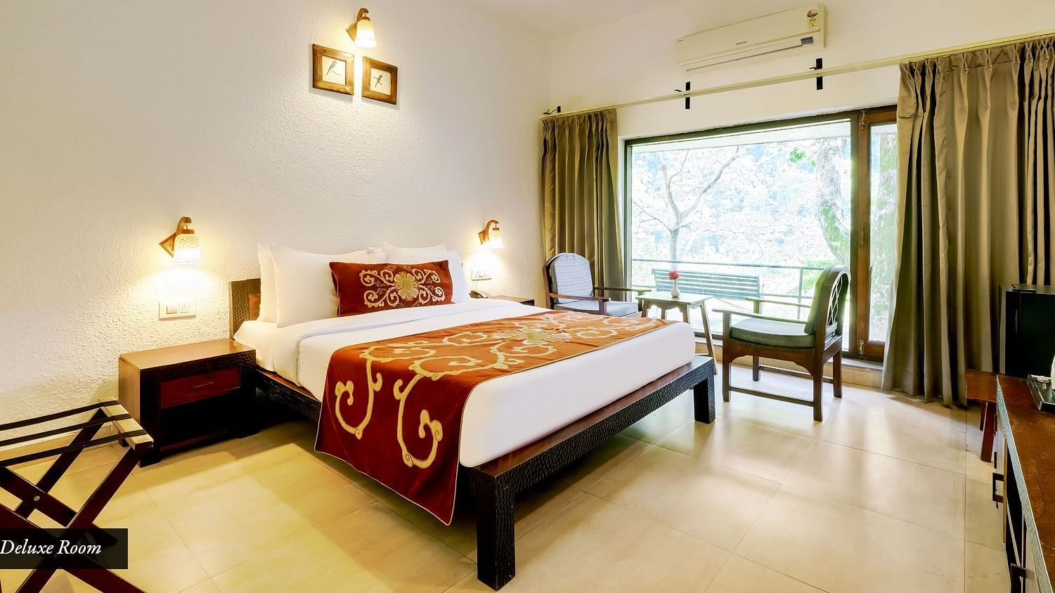Image of a room with bed and large windows at Summit By The Ganges Beach Resort & Spa, Rishikesh