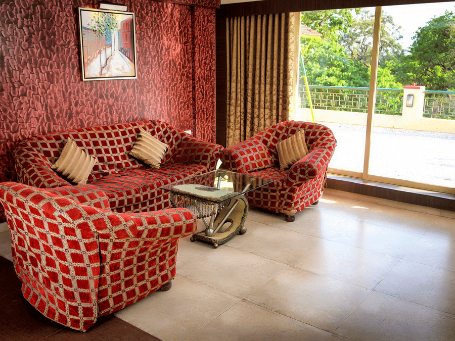 Royal Suite living area featuring sofas and a big widow.