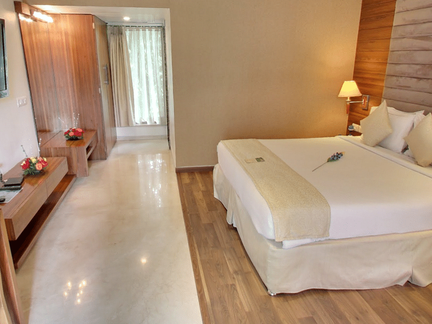 Bedroom with wooden panels and cream tones