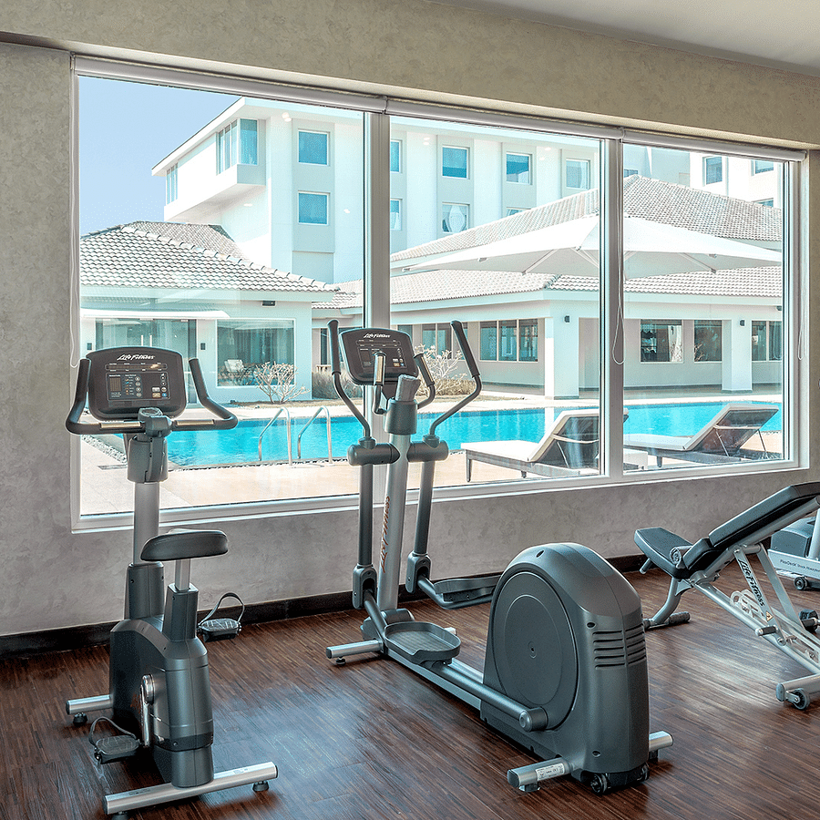 an image of a well-equipped gym at The Residency Towers Rameswaram