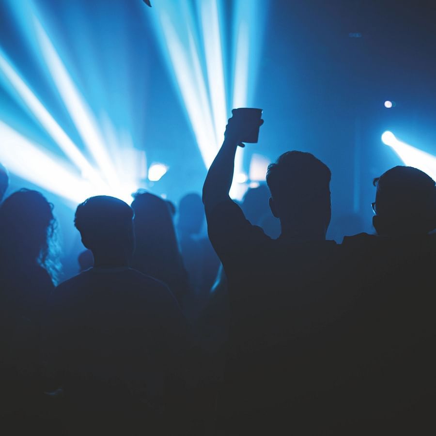 people dancing at an event in goa