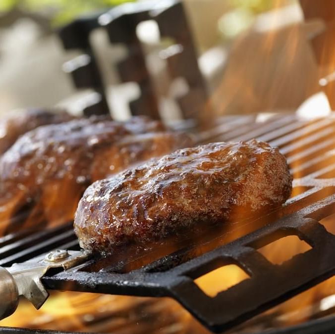 meat being grilled  on the barbecue 1