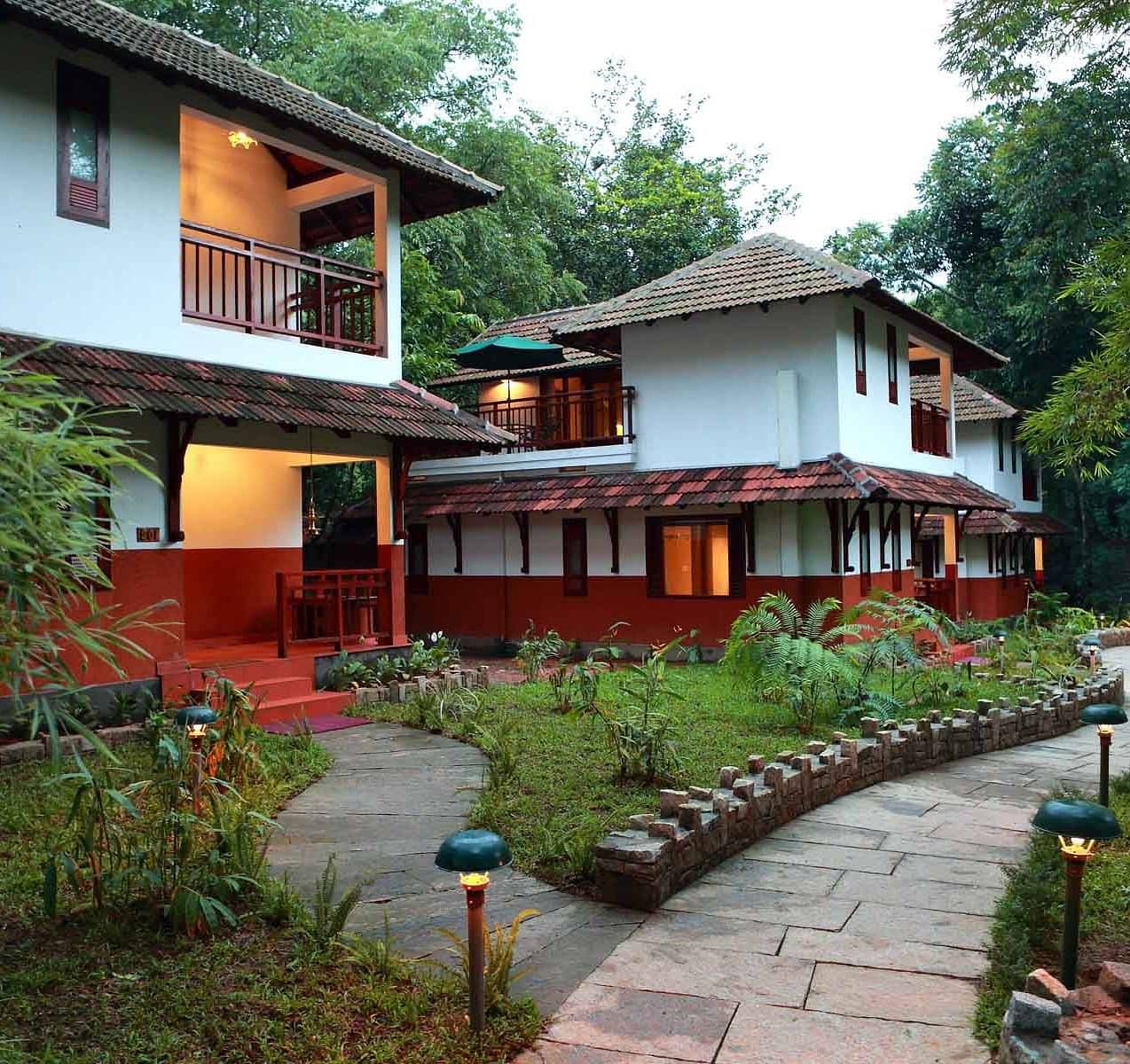An exterior view of two villas in a row | Vythiri Resort. Wayanad