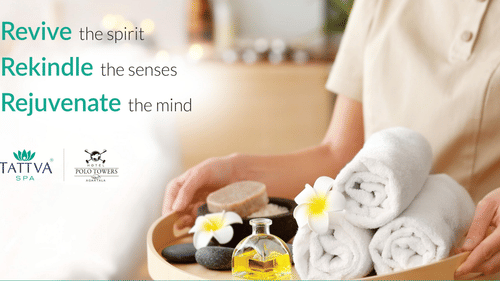 an attendant holding a tray of towels at our spa in agartala