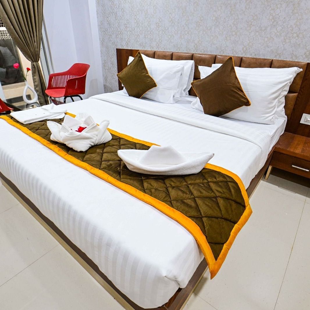 view of the king size beds at Premium Balcony Room of South Square Hotel, Bengaluru