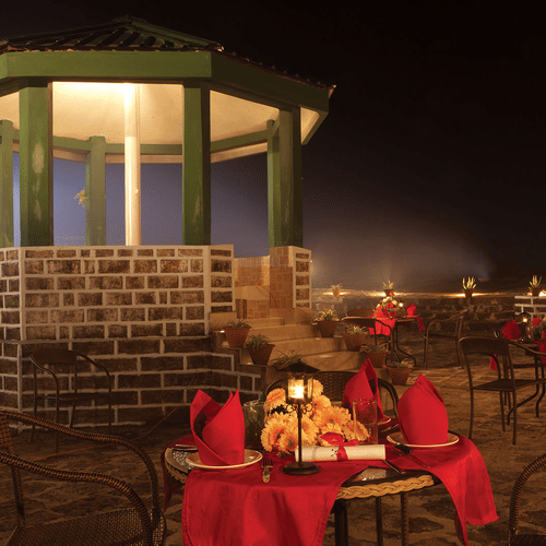 an outdoor seating area during night time