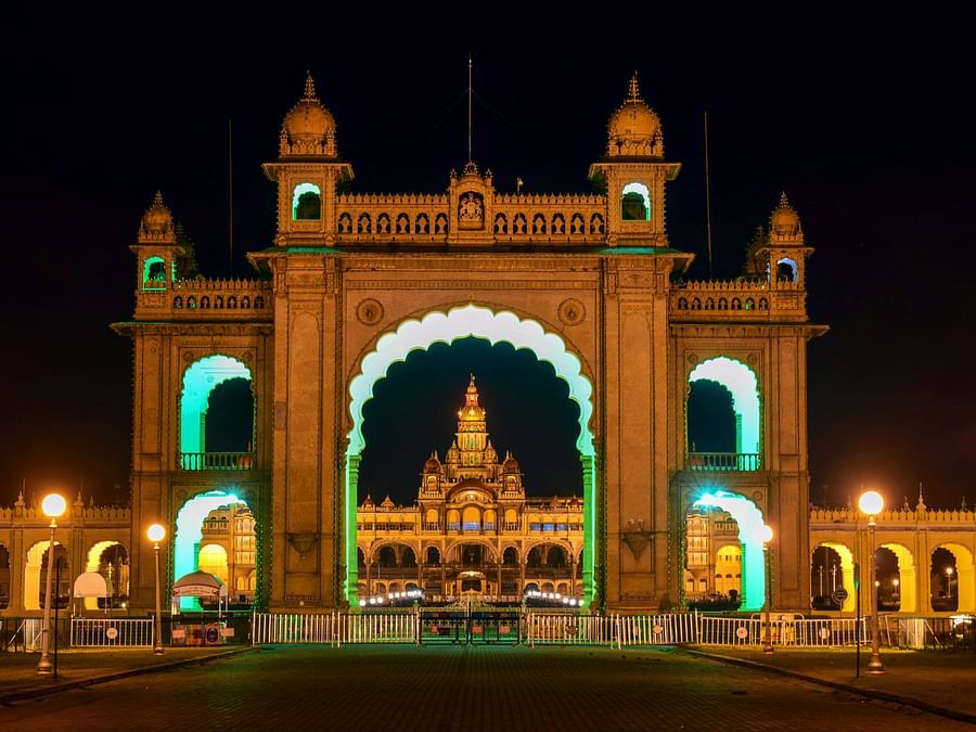 Mysore Palace – A grand and illuminated royal palace showcasing Indo-Saracenic architecture.